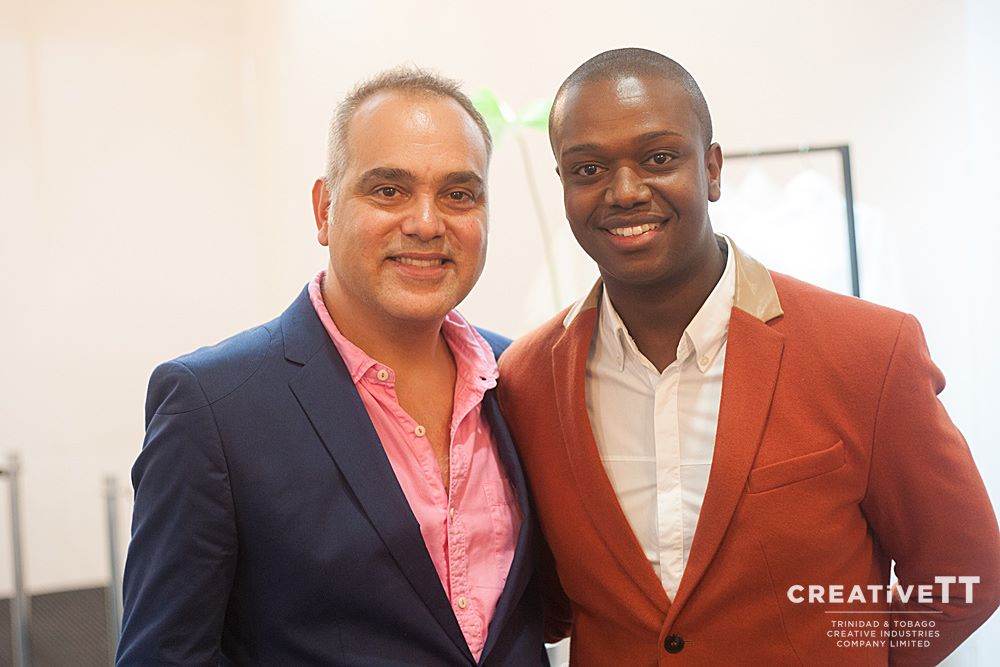 Peter Elias and Rhion Romany smiling together at Masquerade event